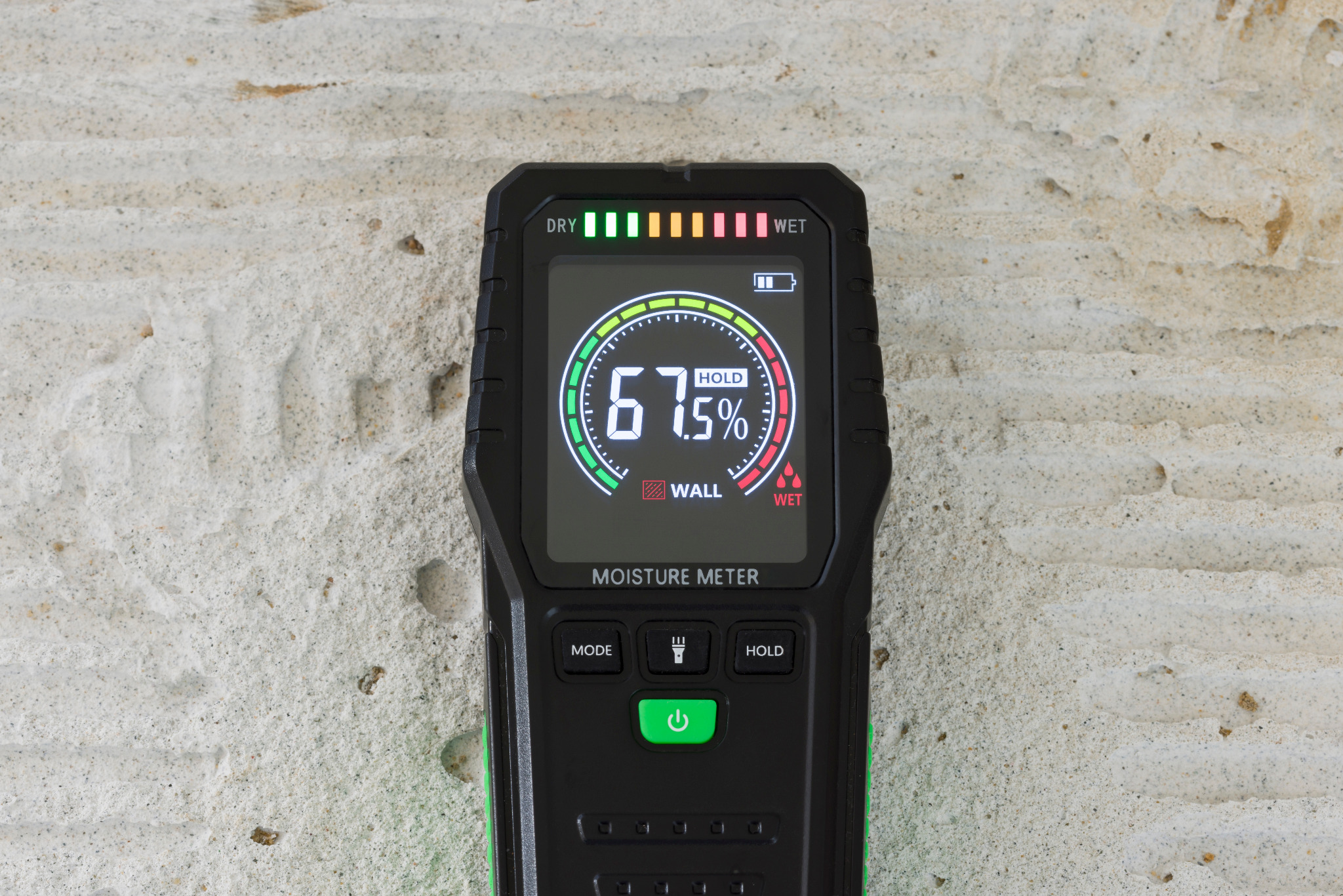 Best Time to Sand Floors – Finchley concrete subfloor moisture test (67.5%) before installing an oak hardwood floor, confirming conditions are not yet suitable for sanding/finishing.